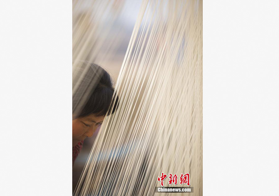 Handmade noodles to greet Spring Festival