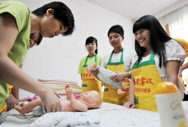 College students train to be domestic helpers