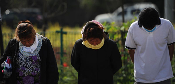 Memorial held for China flood victims