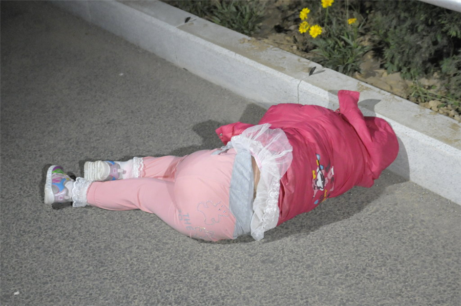 China Daily 2014 photostories: Trials of childhood