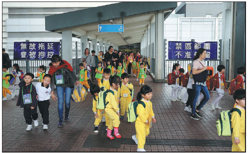 Students cross the line to catch a class act