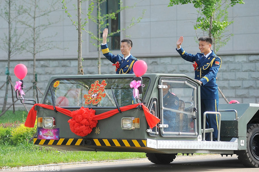 Military-style wedding: Fighter jets, grooms in dashing uniforms