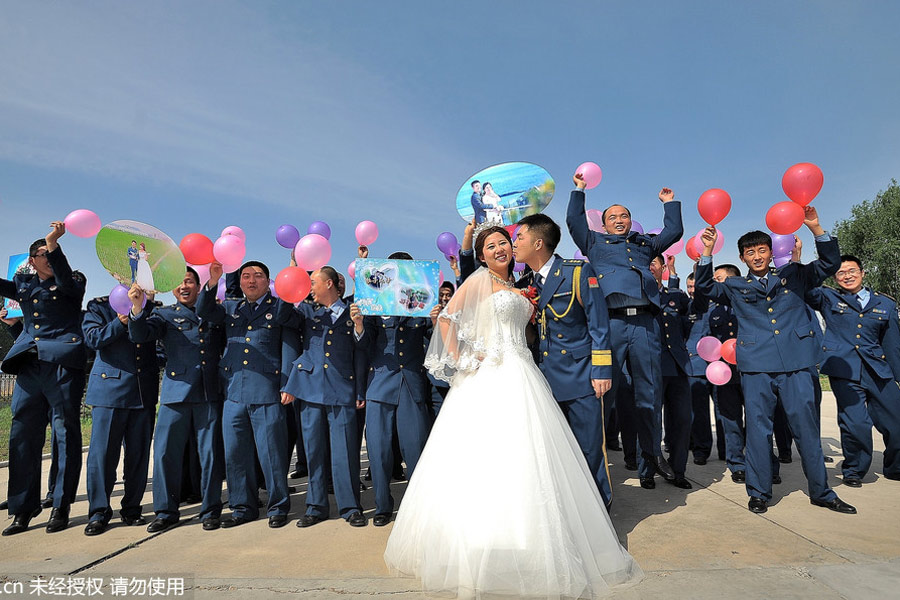 Military-style wedding: Fighter jets, grooms in dashing uniforms