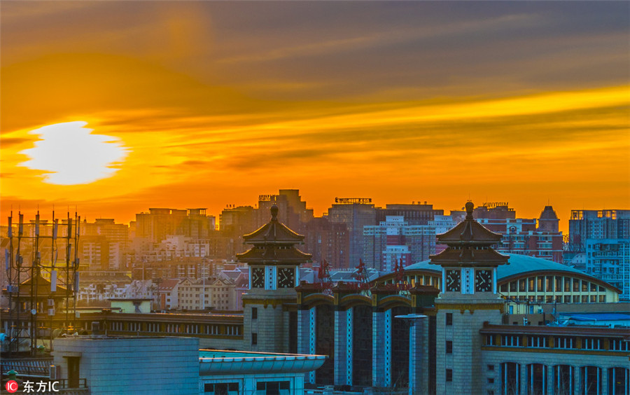 Beijing wakes to rosy dawn