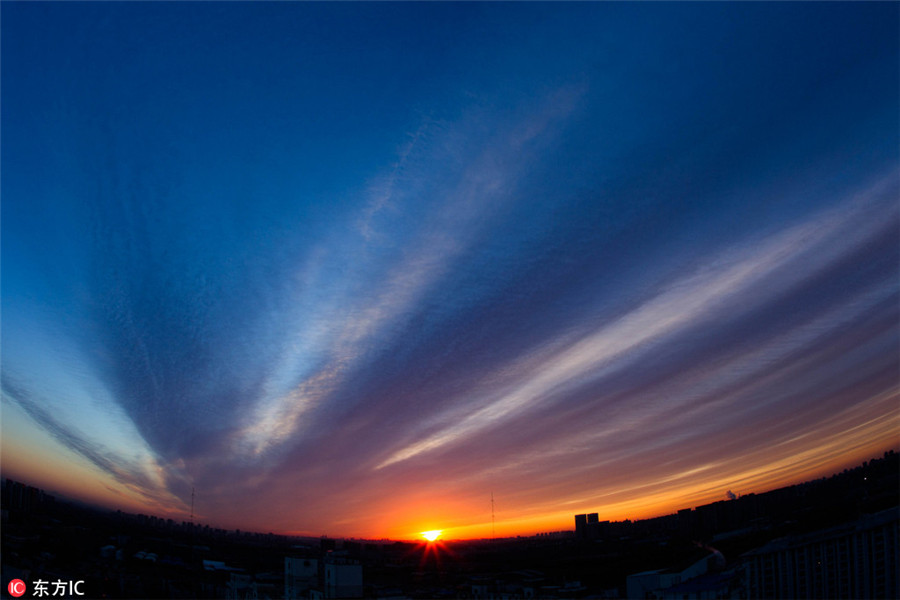 Beijing wakes to rosy dawn