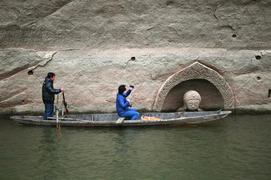 Ancient Buddha found as water level of reservoir lowers in E China