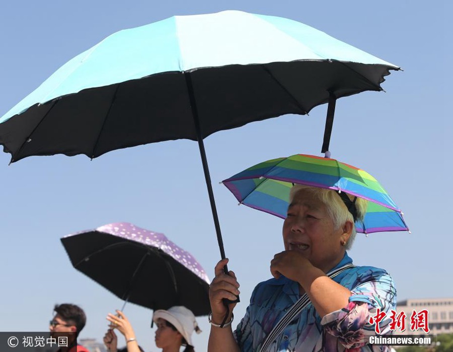 Anything goes as a hat in China's hot summers