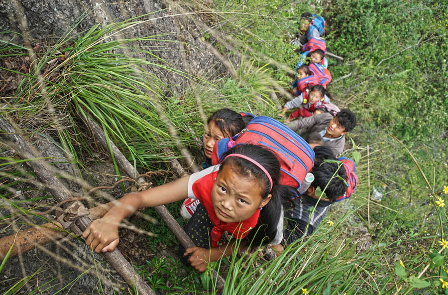 Photographer's work changes life of 'cliff village'