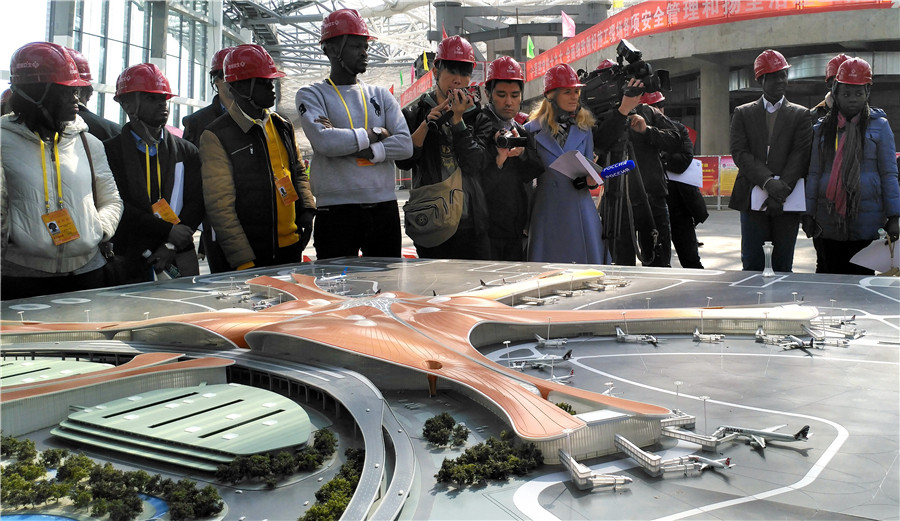 Beijing's new airport getting its roof