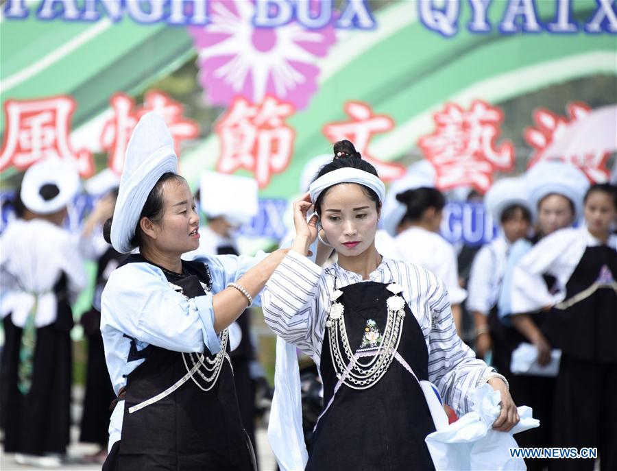 Bouyei ethnic group hold headscarves contest in SW China's Guizhou