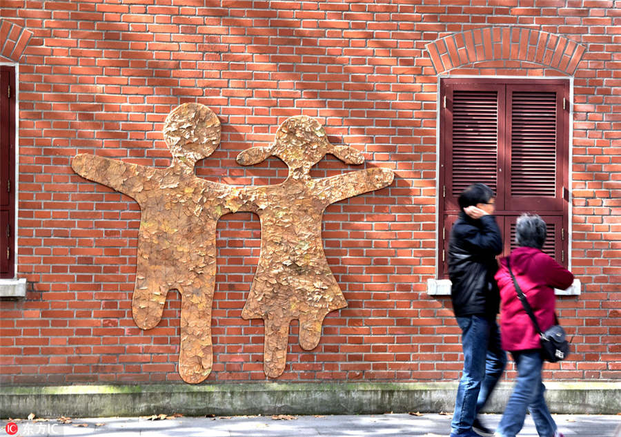 Shanghai stages street art exhibition on fallen leaves