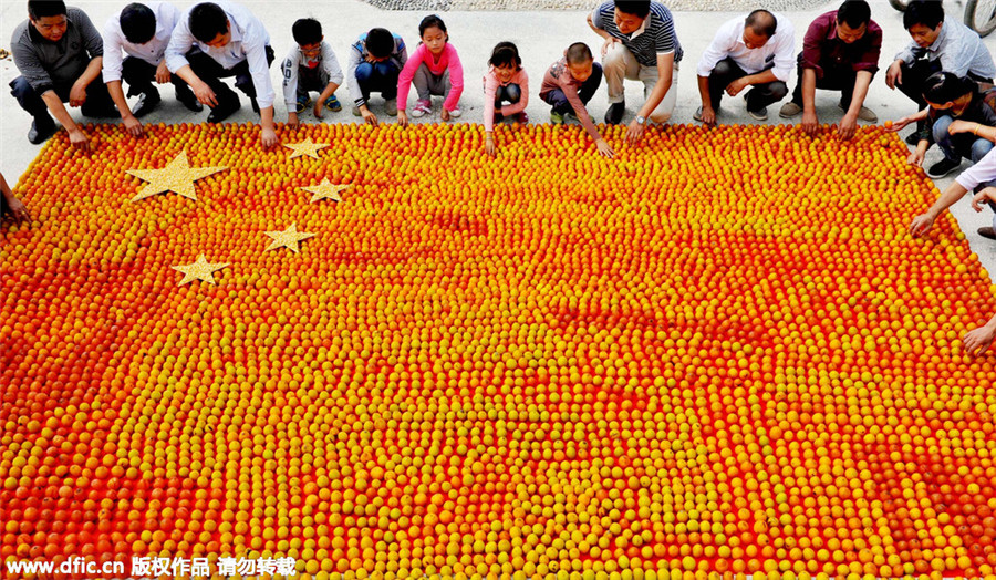 Creative giant flags celebrate National Day