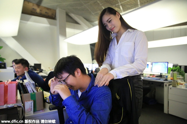 Masseuses melt the stress away at a gaming company