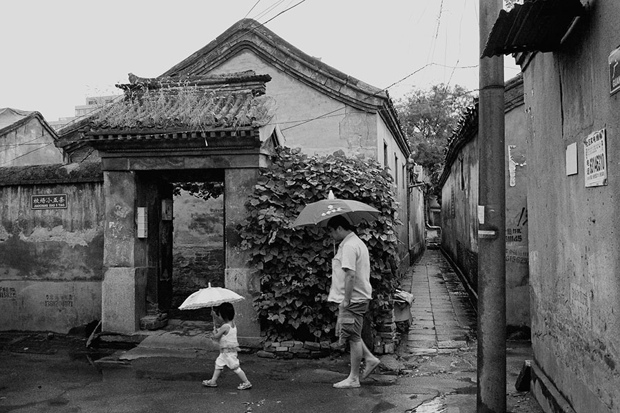 Photo exhibition narrates charm of old Beijing