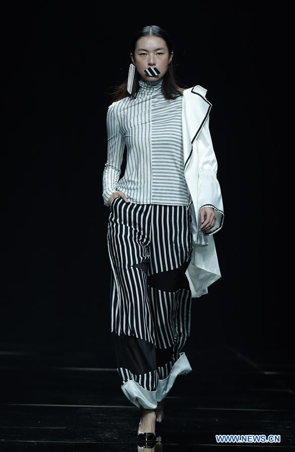 Joint fashion creations presented at China Fashion Week