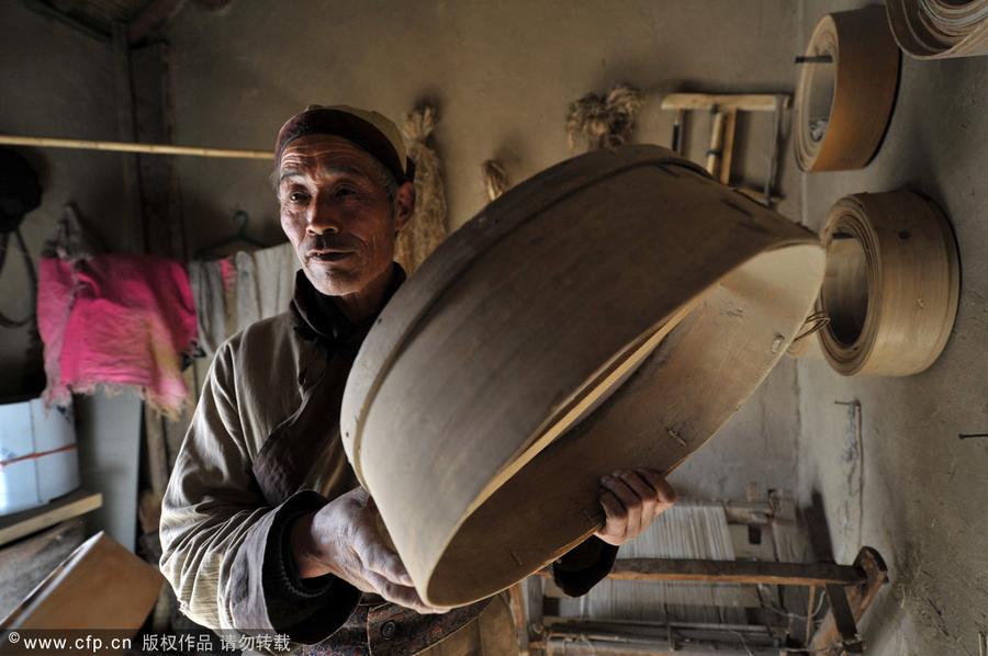 Making flour sifter now a craft of the past