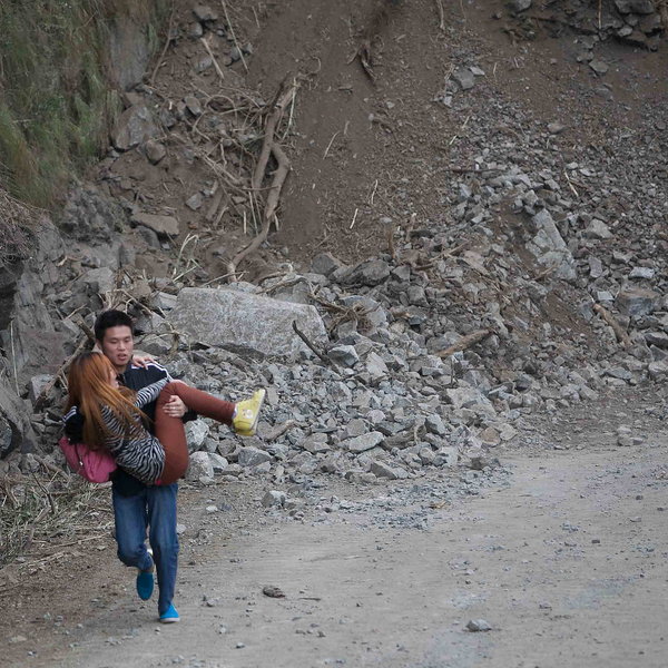 Photos: Man helps friend out of danger