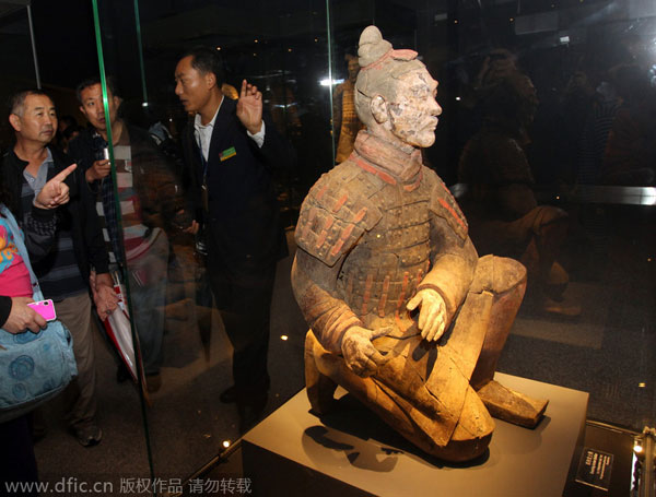 Colored terracotta warriors meet their public