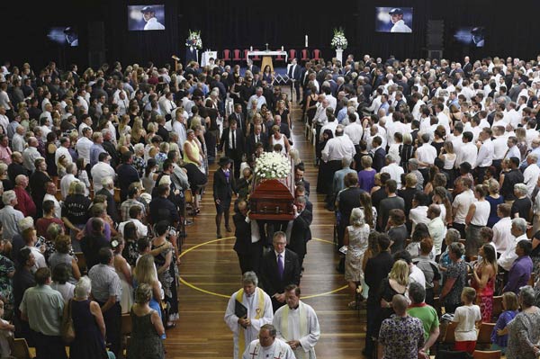 Australia bids farewell to Hughes in hometown funeral