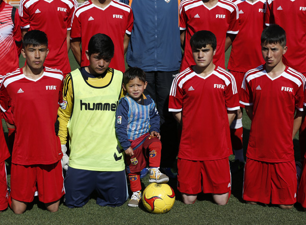 Afghan boy who wore plastic bag 'Messi' shirt gets signed jersey from soccer star