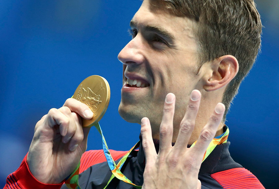 Phelps writes new page with four wins in same event