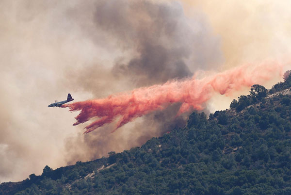 Fire rages through California park