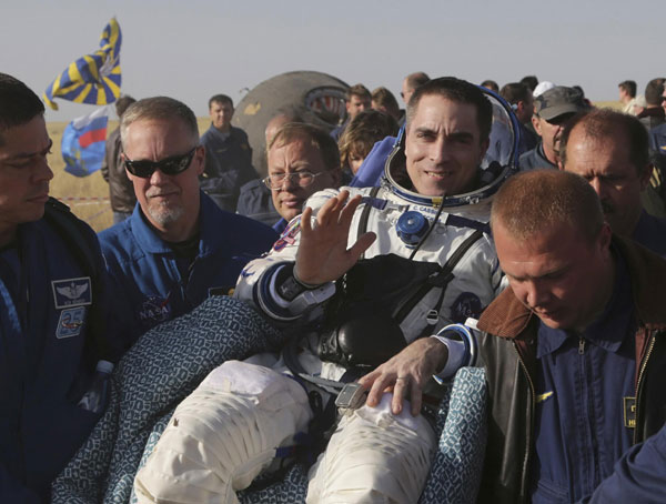 Soyuz capsule returns from space station