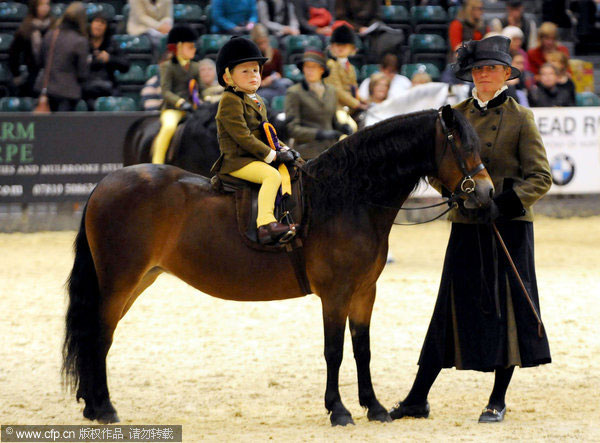 Harry, 3, rides into history books