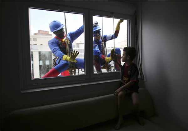 Superheros cheer up sick children