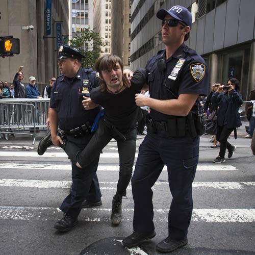 Climate protesters arrested in march on Wall Street