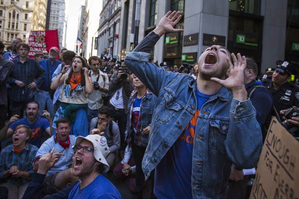 Climate protesters arrested in march on Wall Street