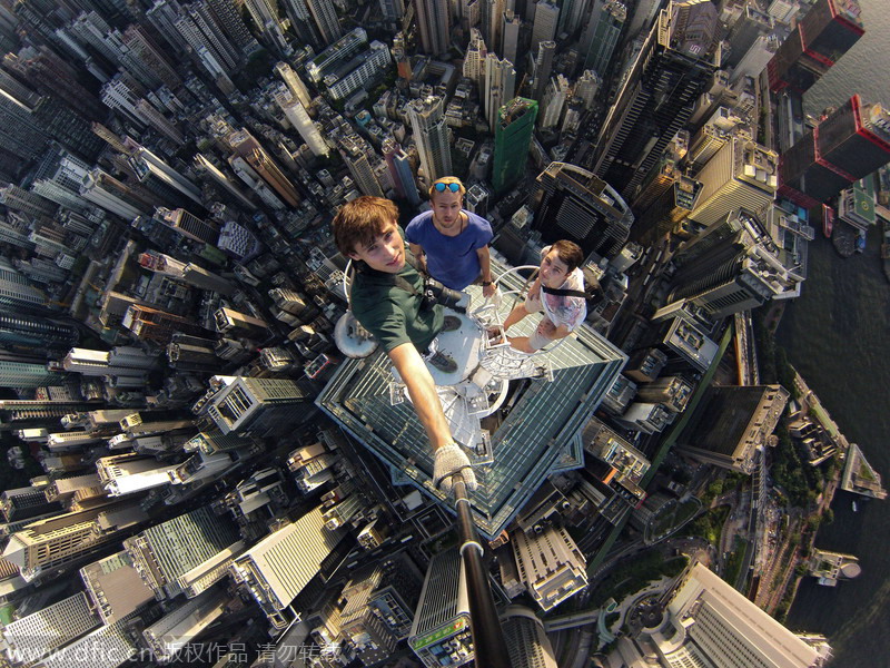 Crazy climbers love selfies in dazzling height