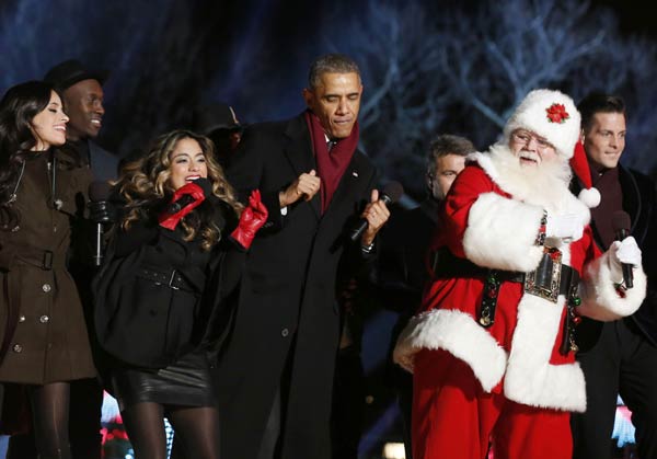 Obamas usher in Christmas with lighting of national tree