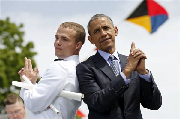 Obama tells Coast Guard grads climate change threatens US