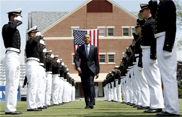 Obama tells Coast Guard grads climate change threatens US