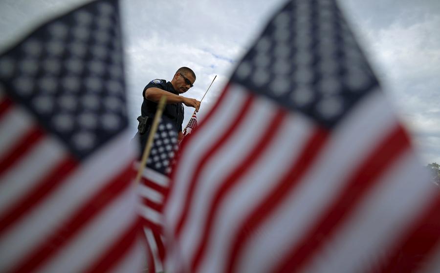 Americans mark the 14th anniversary of 9/11 attacks