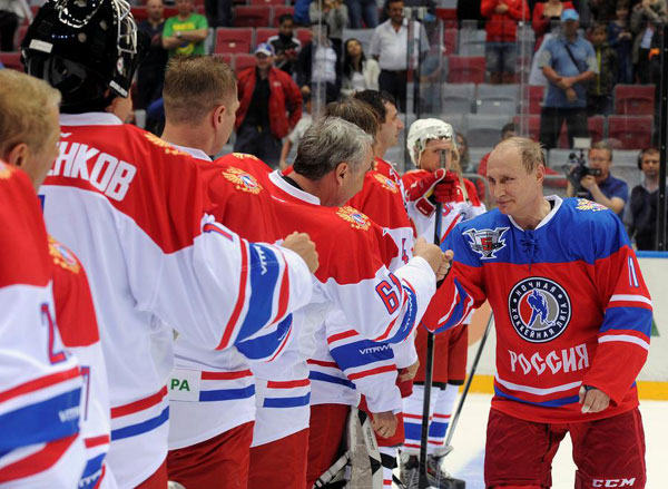 Putin plays ice hockey in Sochi