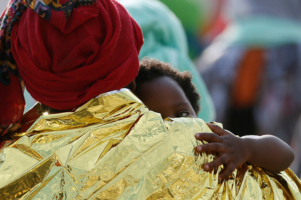 Italy's coastguard says 1,230 migrants rescued on Sunday