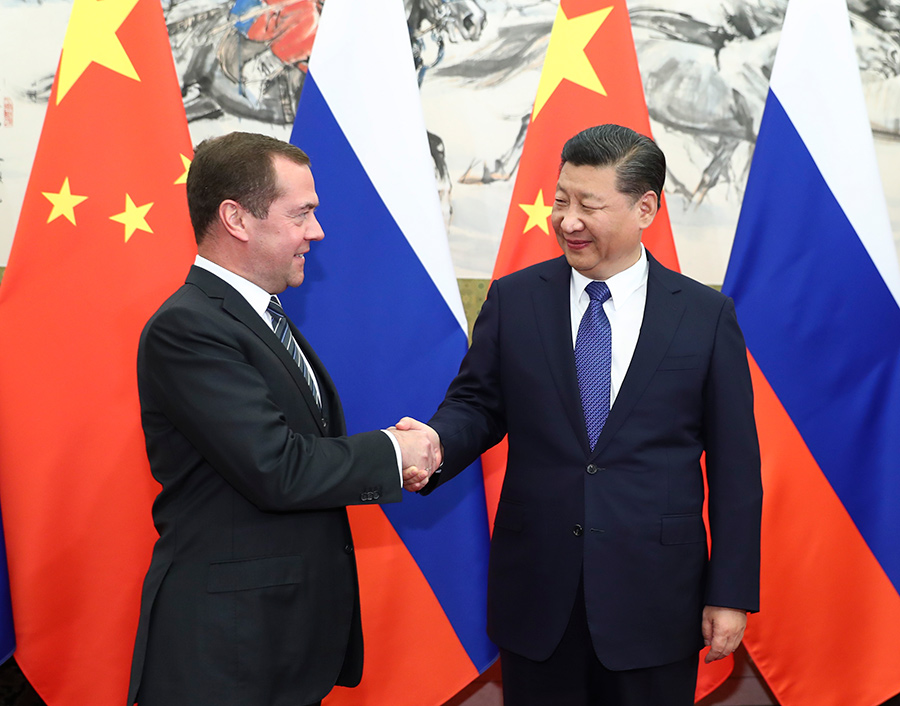 Medvedev packs busy schedule in Beijing